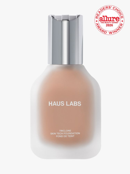 Bottle of Haus Labs Foundation on white background